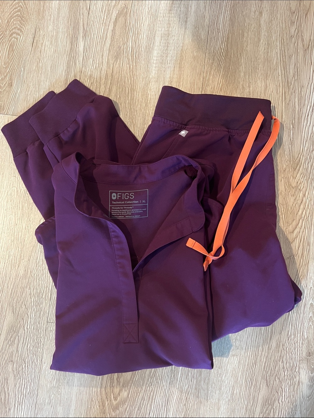 Figs Women's deep purple Scrub Pants & Top with Orange Drawstring